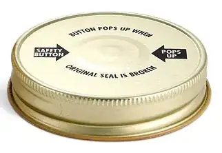 Button pops up when original seal is broken